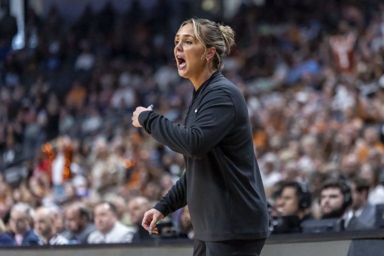 Tennessee Lady Vols head coach Kim Caldwell works with her team during the first half of a Sweet 16 NCAA Tournament basketball game against the Texas Longhorns at Legacy Arena. Mandatory Credit: Vasha