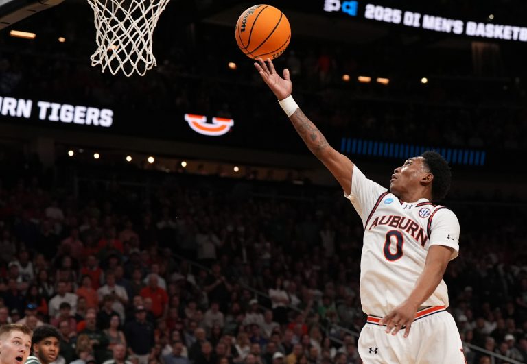 Auburn Tigers guard Tahaad Pettiford (0) drives during the second half in the South Regional final of the 2025 NCAA tournament against the Michigan State Spartans at State Farm Arena.