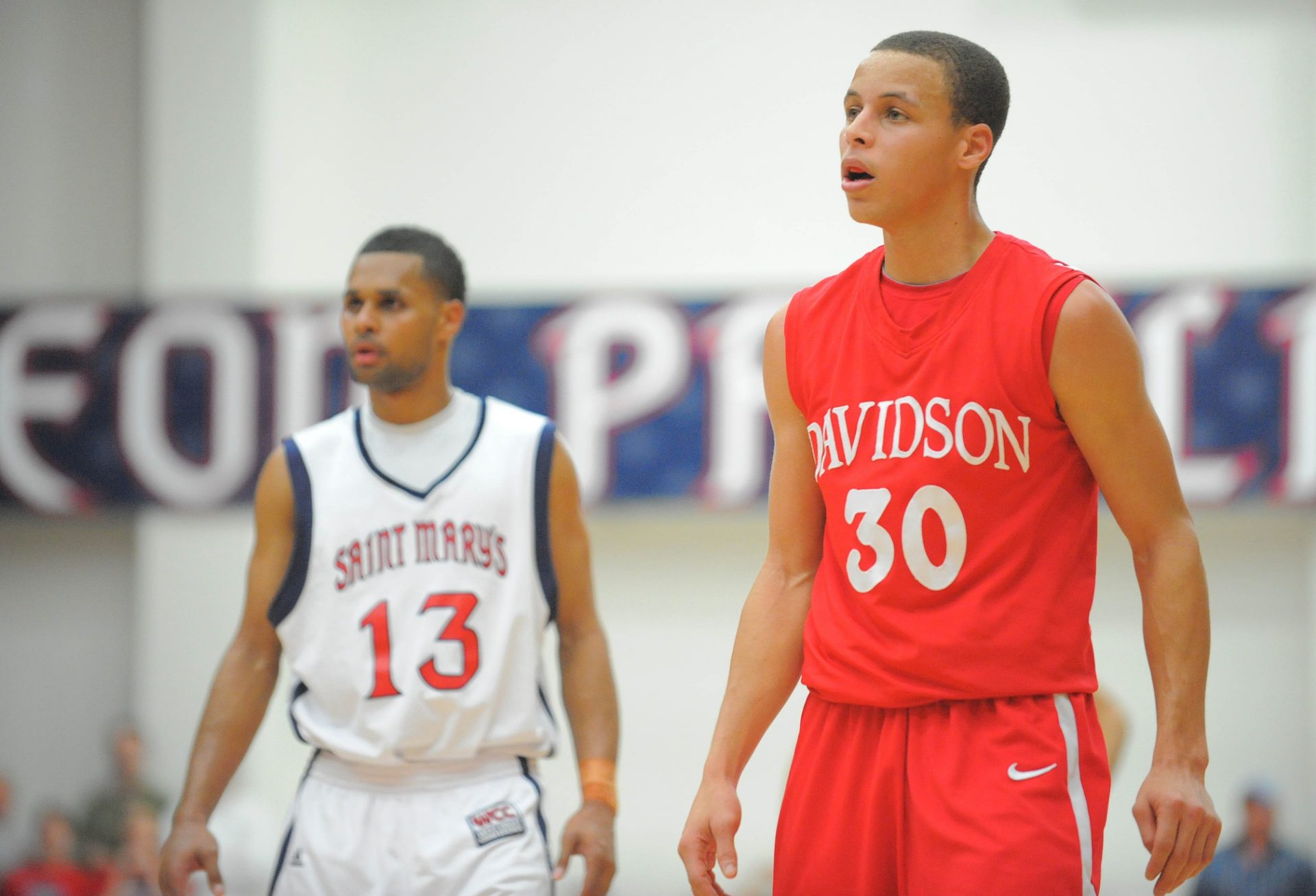 Davidson Wildcats guard Stephen Curry (30) and St. Marys Gaels guard Patrick Mills (13) watch a free-throw during the first half at McKeon Pavilion in Moraga, CA.