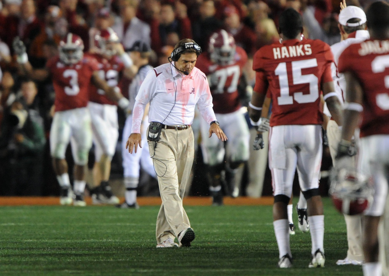 Alabama Crimson Tide head coach Nick Saban reacts after getting dunked with gatorade during the fourth quarter of the 2010 BCS national championship game against the Texas