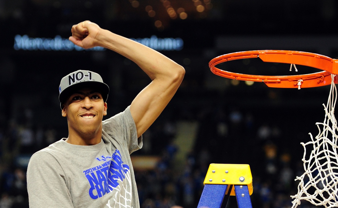 Kentucky Wildcats forward Anthony Davis waves to the crowd after cutting down a piece of the net after the finals of the 2012 NCAA men's basketball Final Four against the Kansas Jayhawks at the Mercedes-Benz Superdome. Kentucky won 67-59.