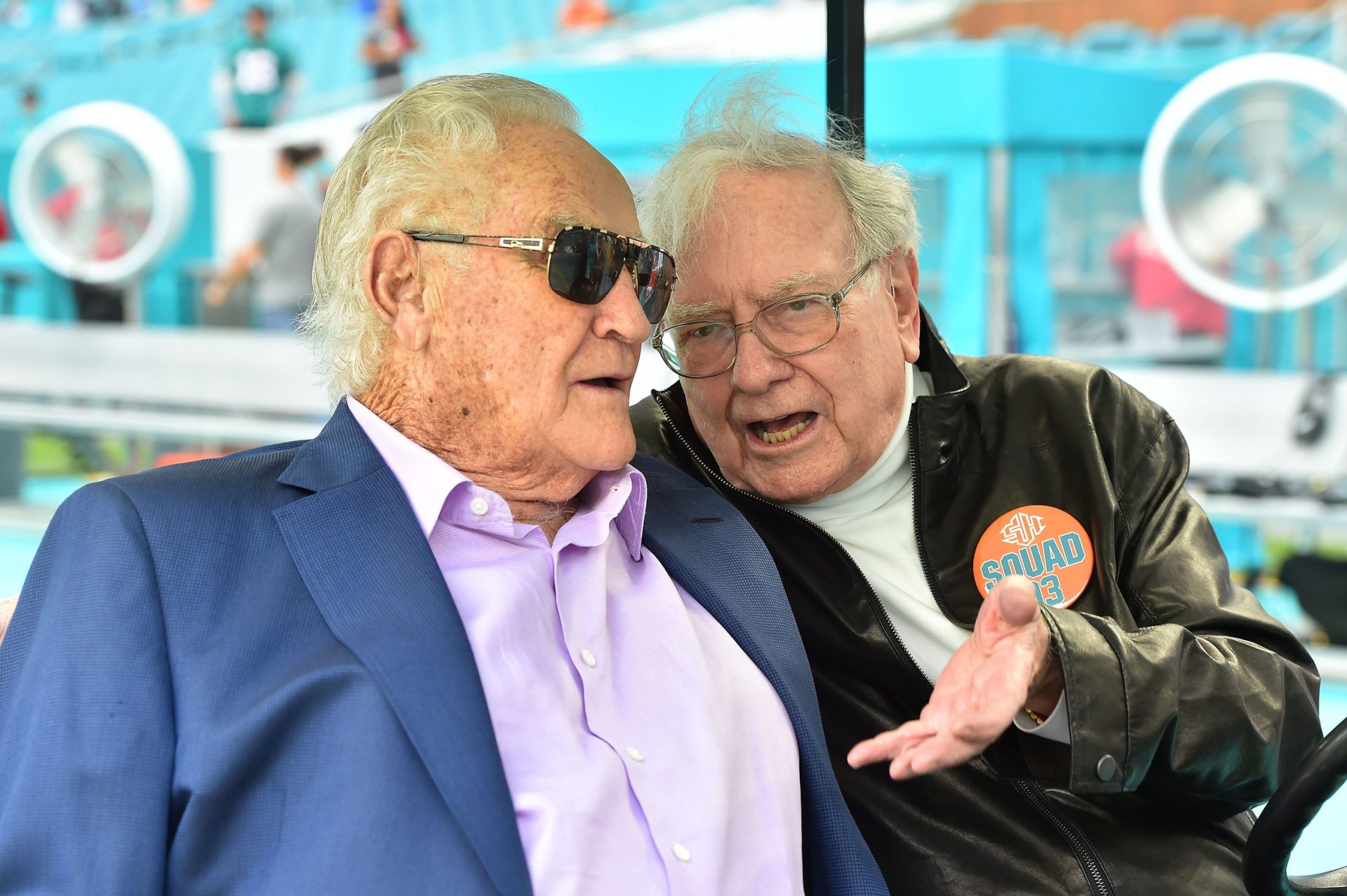 Miami Dolphins former head coach Don Shula (L) talks with Warren Buffet (R) before the game between the Miami Dolphins and the Arizona Cardinals at Hard Rock Stadium.