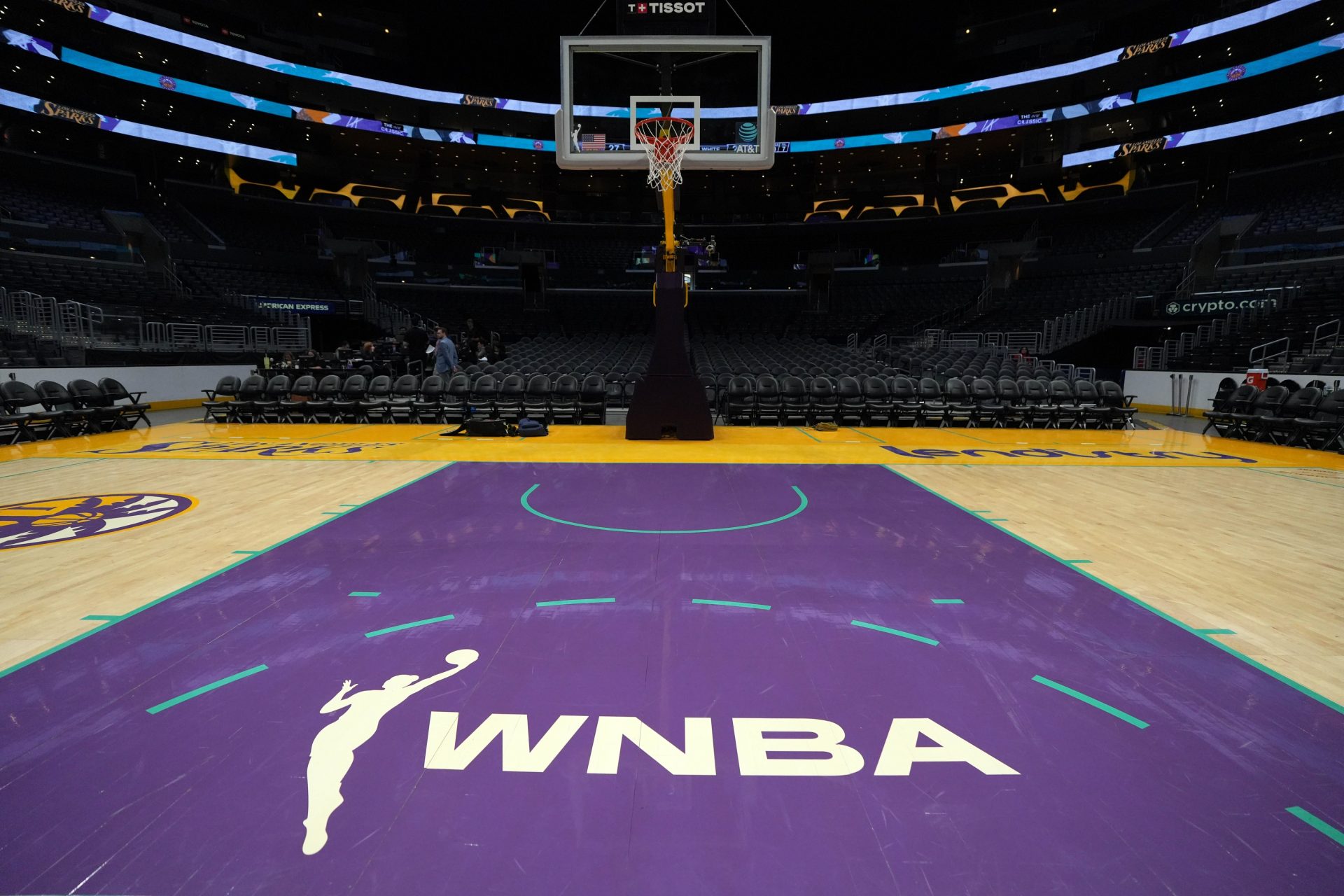 The WNBA logo on the court at Crypto.com Arena.