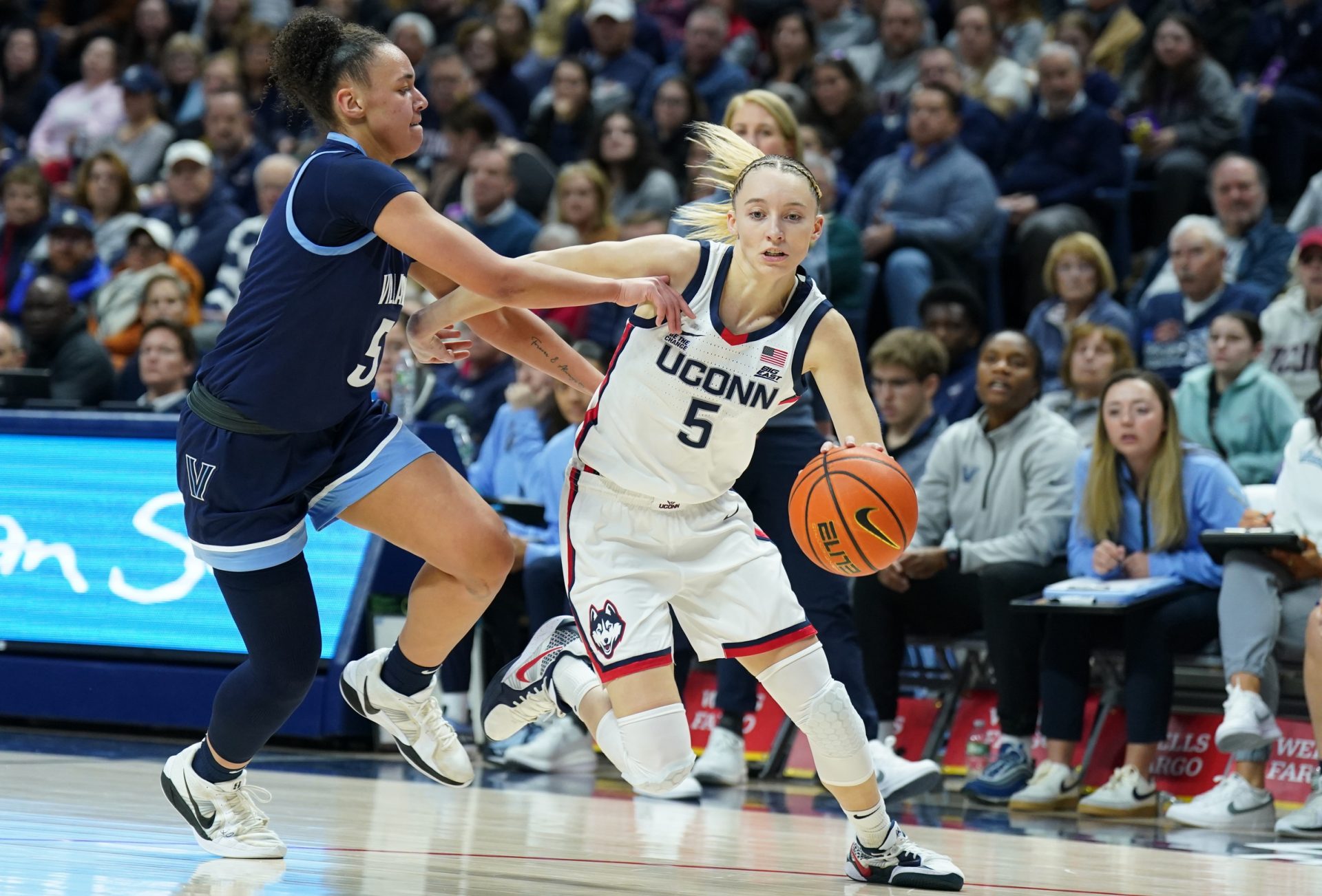 UConn Huskies guard Paige Bueckers (5) drives the ball against Villanova Wildcats guard Ryanne Allen (5) in the first half at Harry A. Gampel Pavilion.