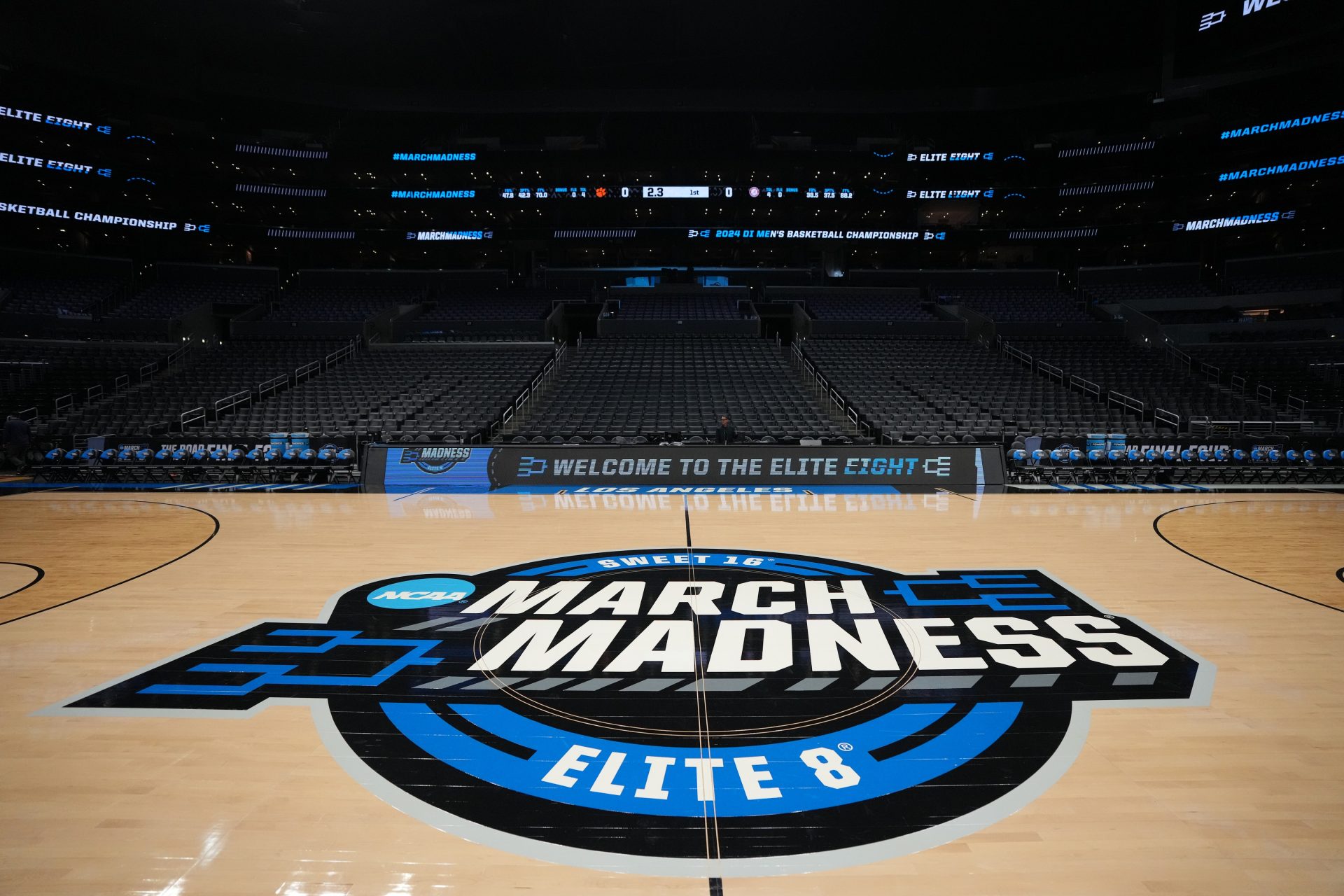 The NCAA March Madness Sweet 16 and Elite Eight logo at midcourt before the game between the Clemson Tigers and the Alabama Crimson Tide in the finals of the West Regional of the 2024 NCAA Tournament at Crypto.com Arena.