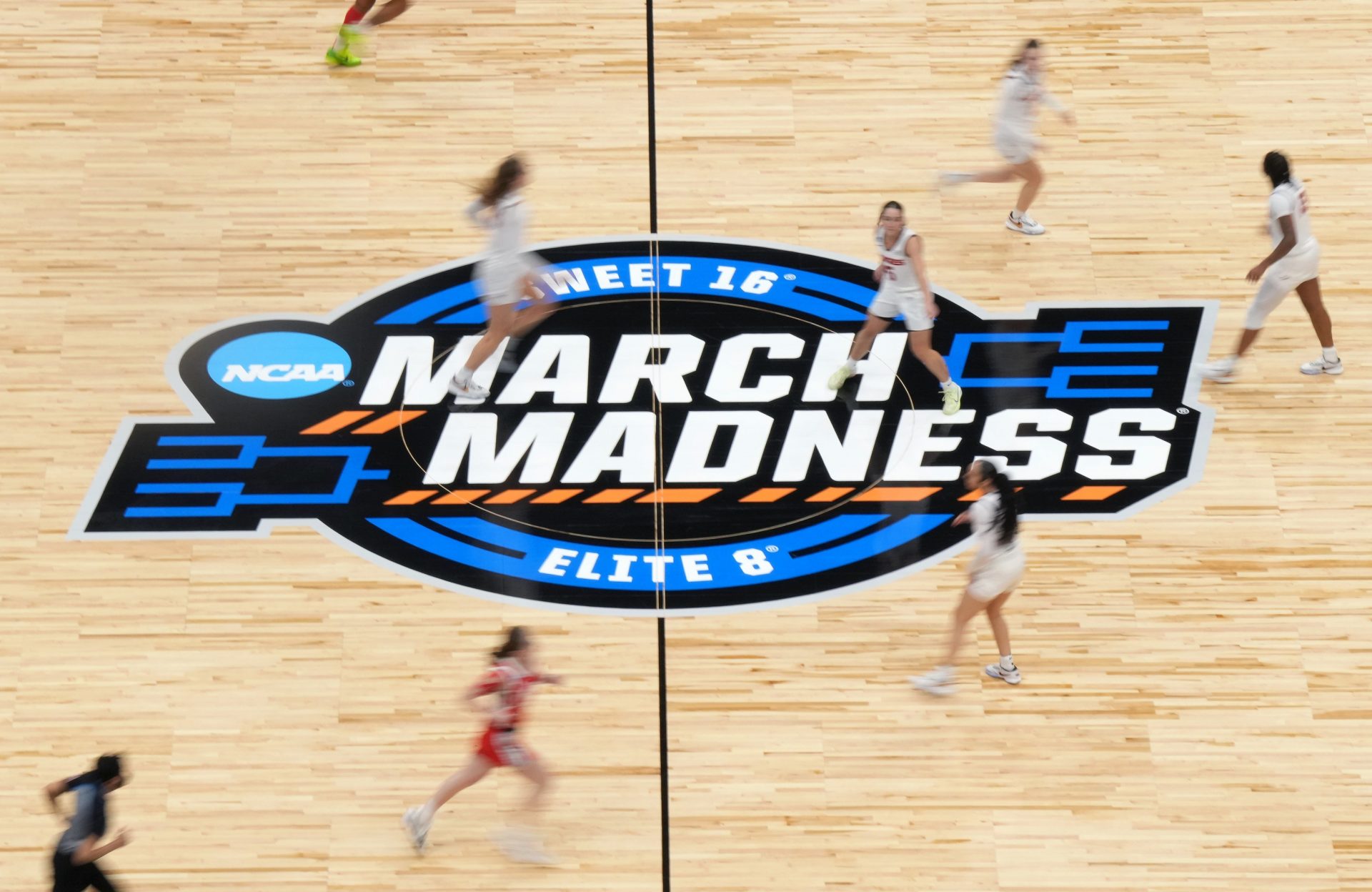 A detailed view of the March Madness center court logo during the first quarter between the Virginia Tech Hokies and the Ohio State Buckeyes at Climate Pledge Arena.