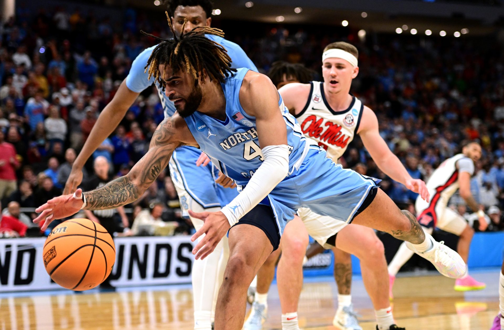 North Carolina Tar Heels guard RJ Davis (4) chases a loose ball during the second half of a first round NCAA men’s tournament game against the Mississippi Rebels at Fiserv Forum.