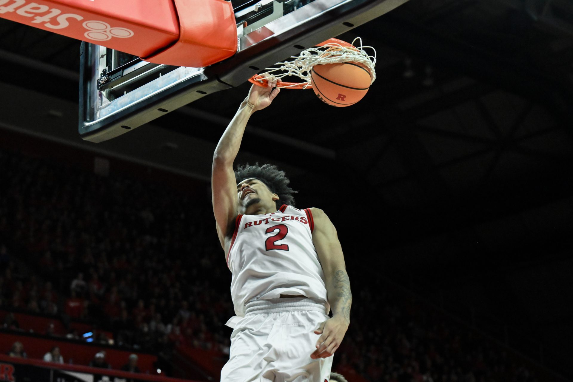 Rutgers Scarlet Knights guard Dylan Harper (2) dunks the ball during the second half against the USC Trojans at Jersey Mike's Arena.