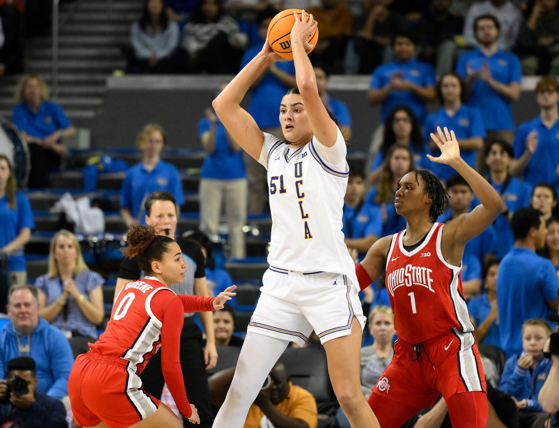 Ohio State Buckeyes guard Madison Greene (0), UCLA Bruins center Lauren Betts (51) and Ohio State Buckeyes forward Ajae Petty (1) during the second quarter at Pauley Pavilion presented by Wescom.