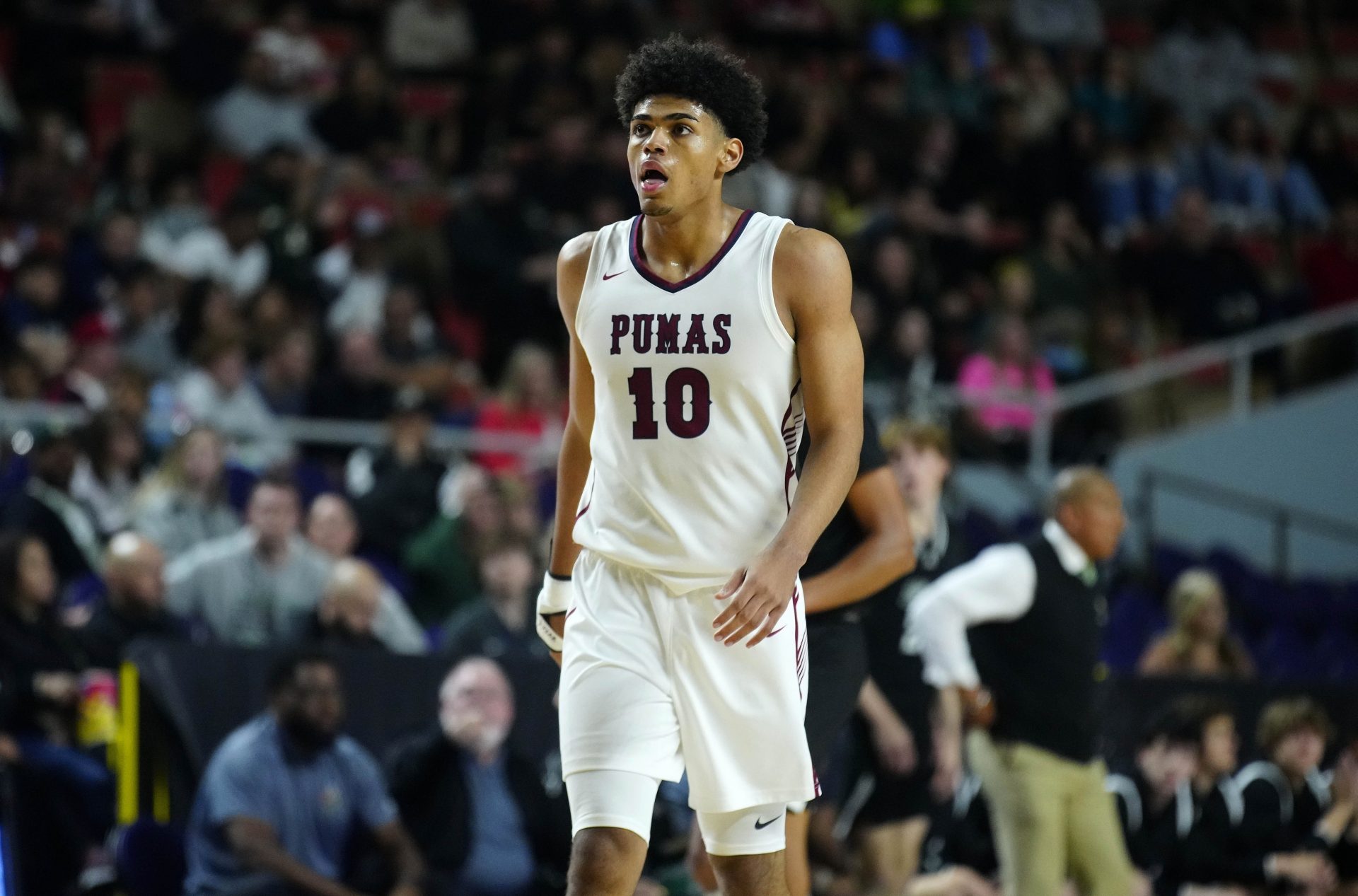 Perry forward Koa Peat (10) walks back down the court during a timeout against Sunnyslope during the Boys Open State Championship at Veterans Memorial Coliseum.