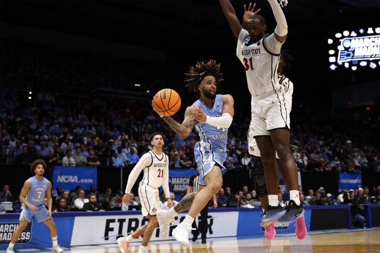 North Carolina Tar Heels guard RJ Davis (4) plays the ball defende day San Diego State Aztecs forward Jared Coleman-Jones (31) in the second half at UD Arena.