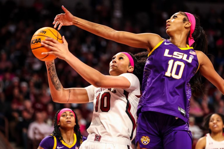 South Carolina Gamecocks center Kamilla Cardoso (10) drives past LSU Lady Tigers forward Angel Reese (10) in the first half at Colonial Life Arena.