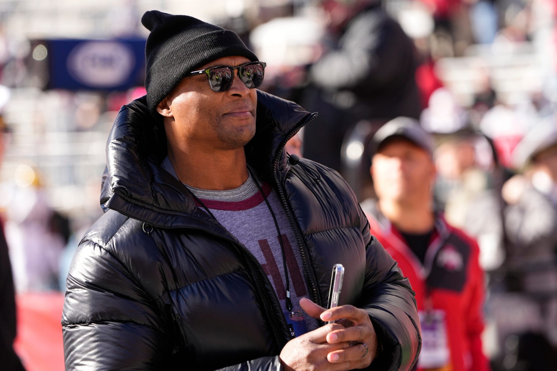 Eddie George watches warm-ups prior to the NCAA football game between the Ohio State Buckeyes and the Michigan Wolverines at Ohio Stadium.
