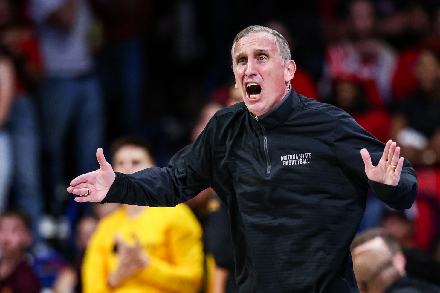 Arizona State Sun Devils head coach Bobby Hurley yells out toward his team during the second half against the Arizona Wildcats at McKale Center.