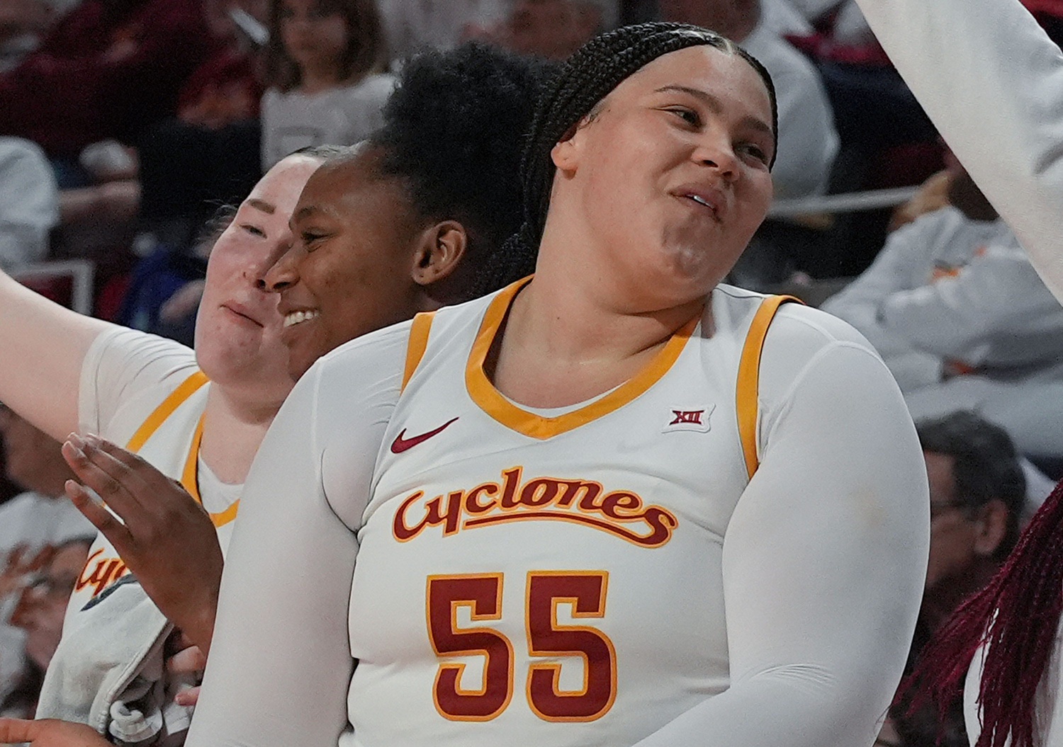 Iowa State Cyclones' center Audi Crooks (55), forward Alisa Williams (3), and forward Addy Brown (24) celebrate after winning 86-56 over Colorado in the Big-12 women’s basketball at Hilton Coliseum