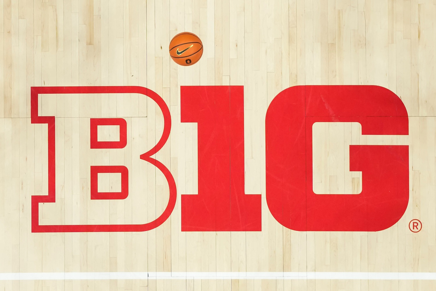 Iowa Hawkeyes guard Caitlin Clark (22) shoots a free throw over the Big Ten Conference logo during the NCAA women’s basketball game against the Ohio State Buckeyes