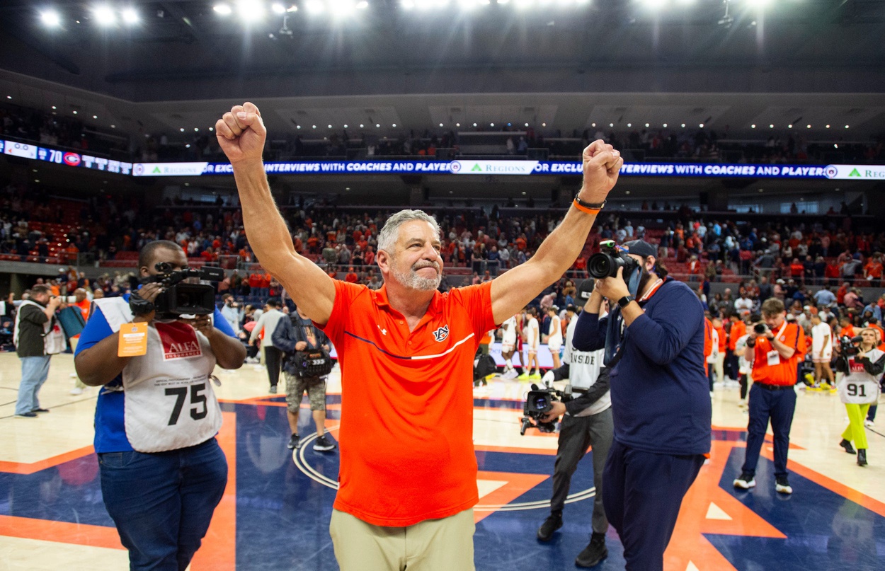 Auburn Tigers head coach Bruce Pearl celebrates victory as Auburn Tigers take on Georgia Bulldogs