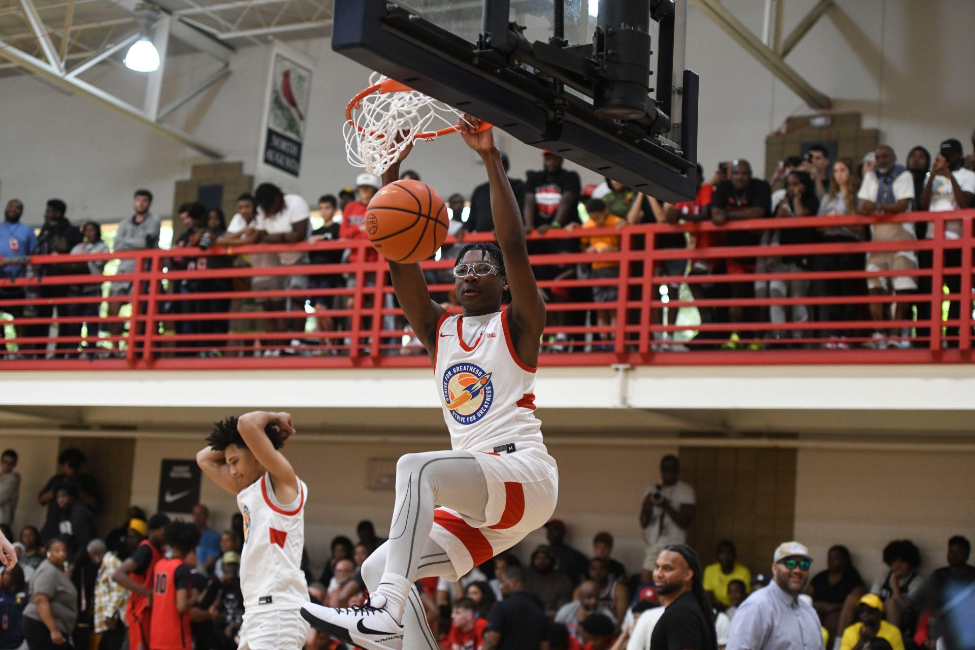 Bryce James, son of LeBron James, warms up before the E16 Strive for Greatness and Expressions game