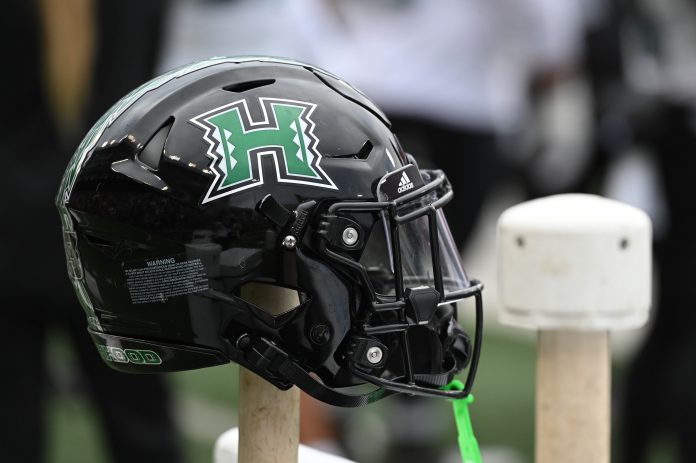 Hawaii Warriors helmet sits during a game against the Washington State Cougars in the second half at Gesa Field at Martin Stadium.