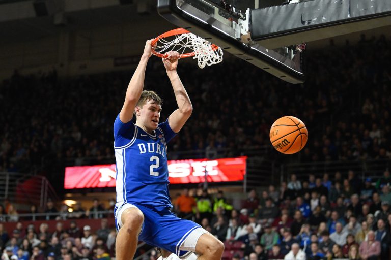 Duke Blue Devils guard Cooper Flagg (2) dunks the ball against the Boston College Eagles during the first half at Conte Forum.