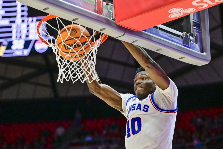 Kansas Jayhawks forward Flory Bidunga (40) dunks the ball against the Utah Utes during the first half at the Jon M. Huntsman Center.