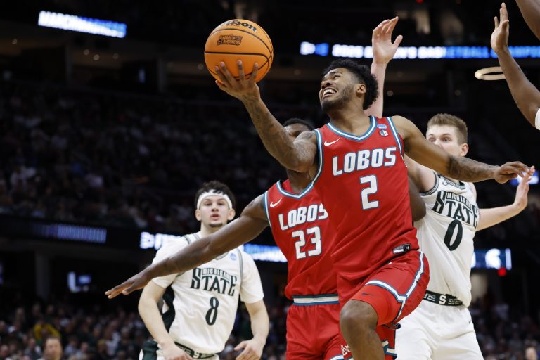 New Mexico Lobos guard Donovan Dent (2) shoots the ball in the second half against the Michigan State Spartans during the NCAA Tournament Second Round at Rocket Arena.