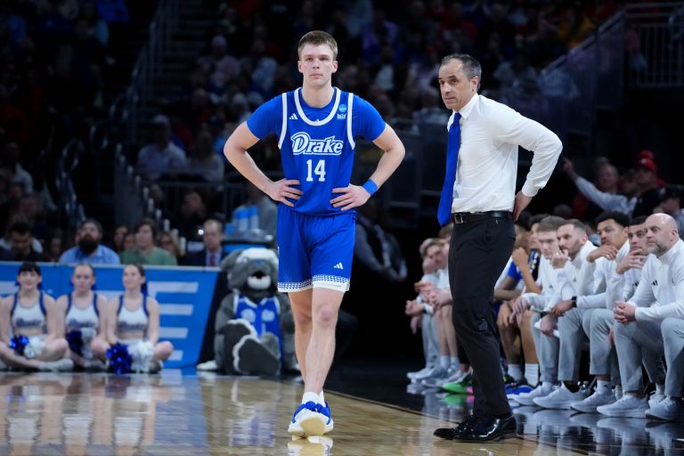 Drake Bulldogs guard Bennett Stirtz (14) talks with head coach Ben McCollum during the second half at Intrust Bank Arena.