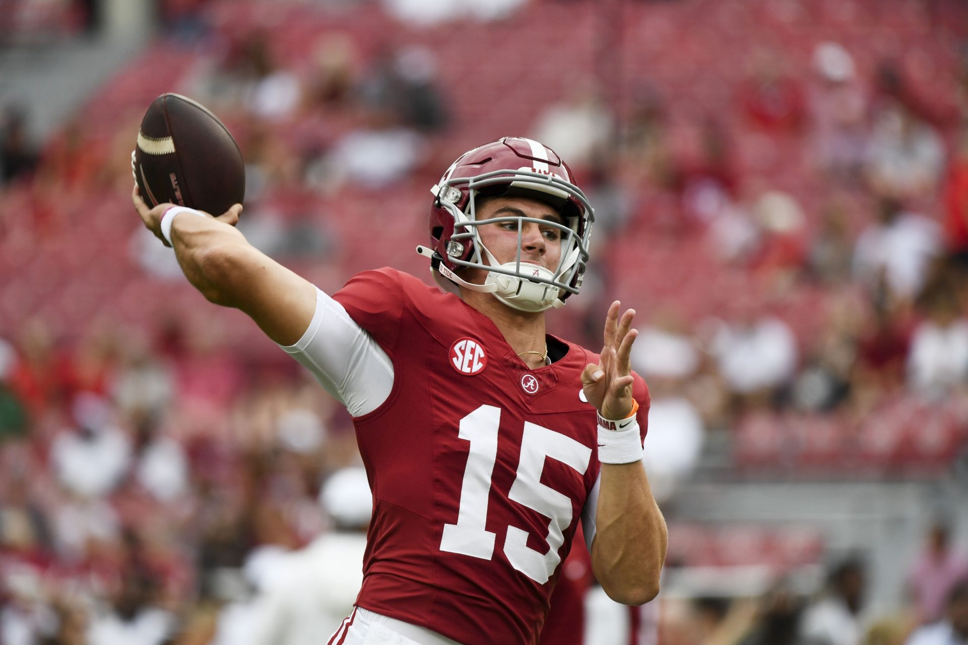 Alabama Crimson Tide quarterback Ty Simpson (15) warms up before a game against the South Florida Bulls at Bryant-Denny Stadium.