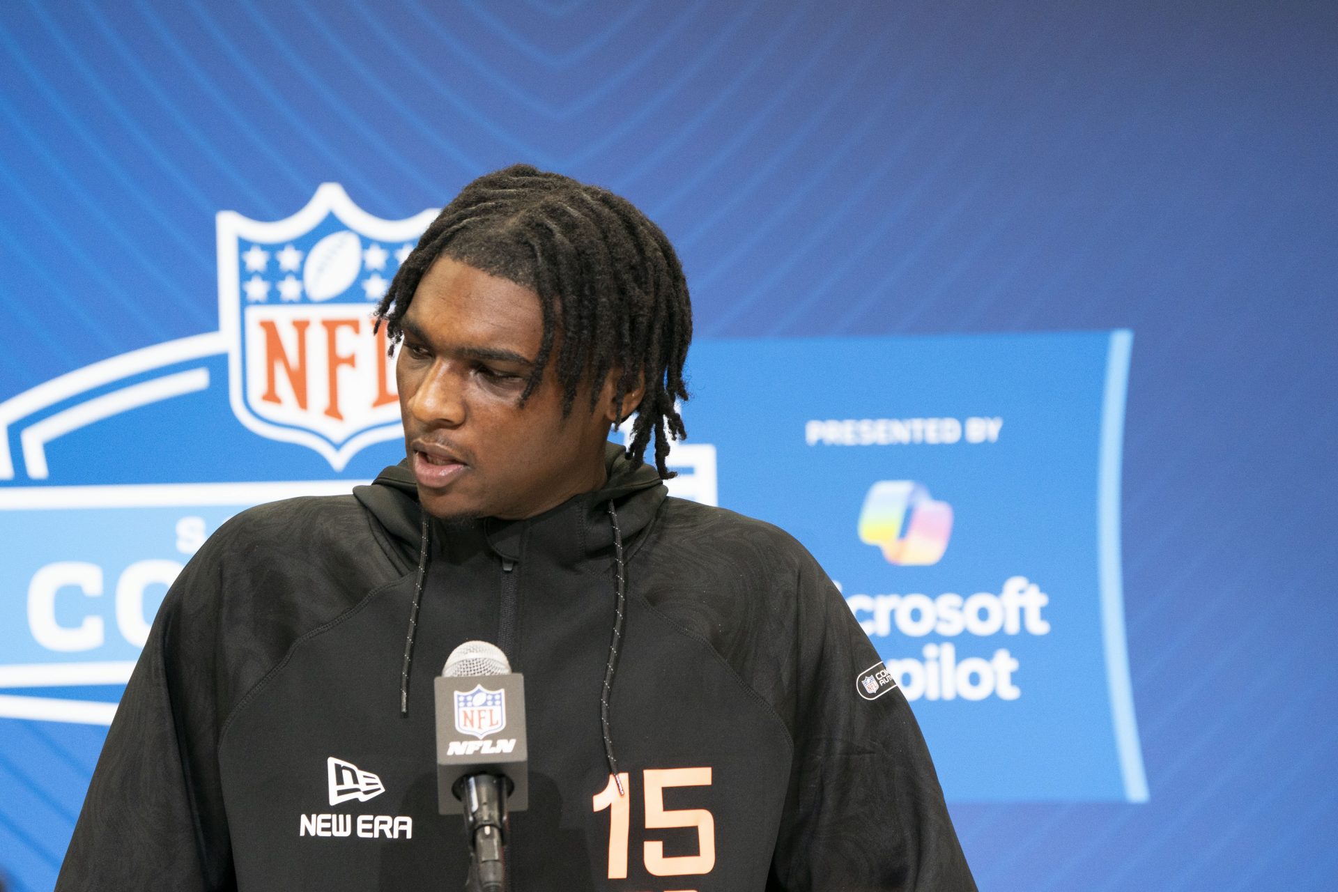 Miami quarterback Cam Ward (QB15) talks to the press during the 2025 NFL Combine at Indiana Convention Center.