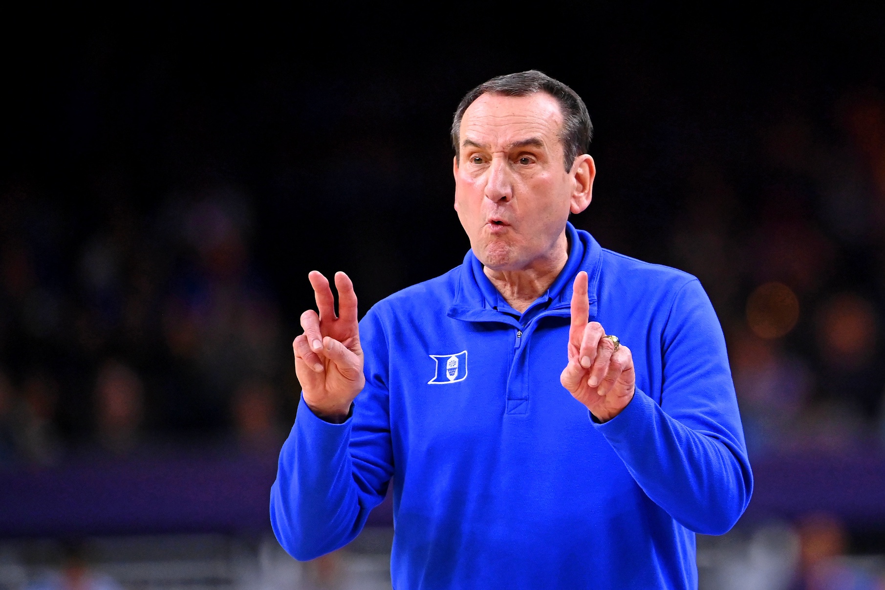 Duke Blue Devils head coach Mike Krzyzewski gestures to his team against the North Carolina Tar Heels during the second half during the 2022 NCAA men's basketball tournament Final Four semifinals at Caesars Superdome.