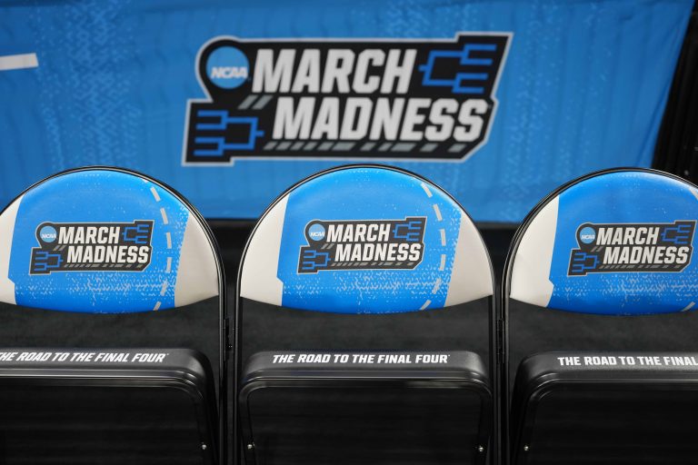 The March Madness logo on the team seats at the Intrust Bank Arena.