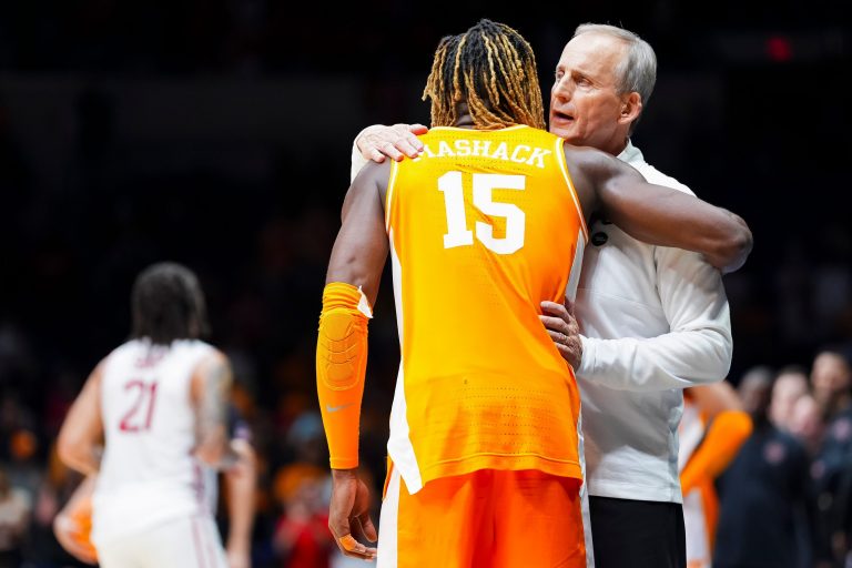 Tennessee head coach Rick Barnes gives Tennessee guard Jahmai Mashack (15) a hug after a NCAA Tournament Elite Eight game between Tennessee and Houston at Lucas Oil Stadium in Indianapolis, Ind.,