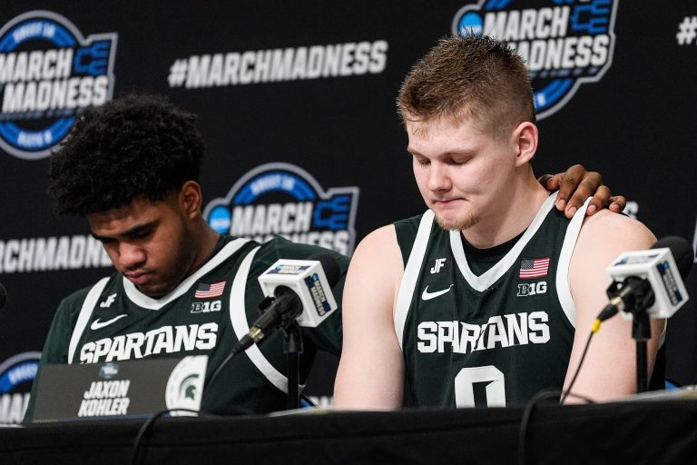 Michigan State guard Jase Richardson (11), left, and forward Jaxon Kohler (0) answer questions at post game press conference