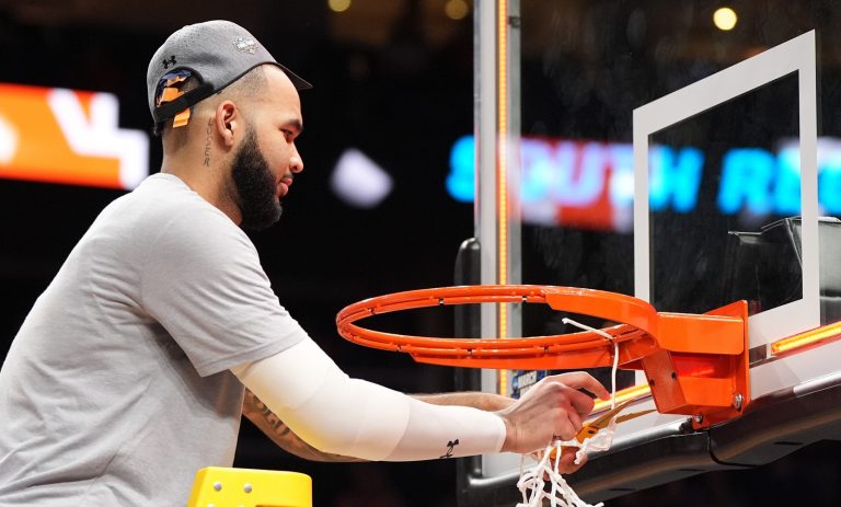 Auburn Tigers forward Johni Broome (4) celebrates after winning the South Regional final of the 2025 NCAA tournament against the Michigan State Spartans at State Farm Arena.