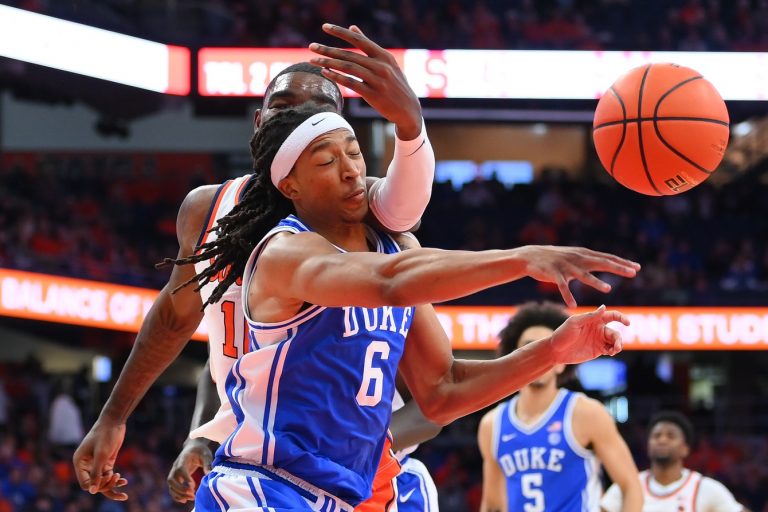 Duke Blue Devils forward Maliq Brown (6) gets hit in the face by Syracuse Orange center Naheem McLeod (back) while reaching for the ball during the second half at the JMA Wireless Dome.