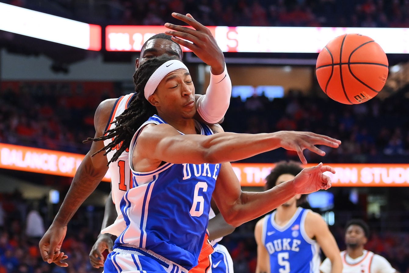 Duke Blue Devils forward Maliq Brown (6) gets hit in the face by Syracuse Orange center Naheem McLeod (back) while reaching for the ball during the second half at the JMA Wireless Dome.