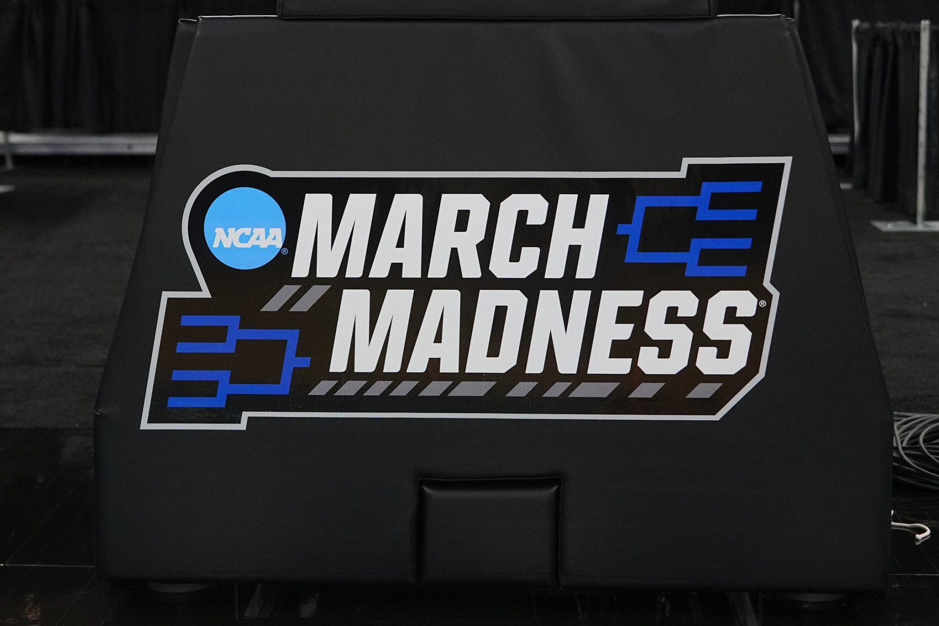 A general view of the March Madness sign and logo on the basket during the first round practice session at Amica Mutual Pavilion.