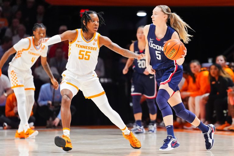 Tennessee guard Talaysia Cooper (55) defends UConn guard Paige Bueckers