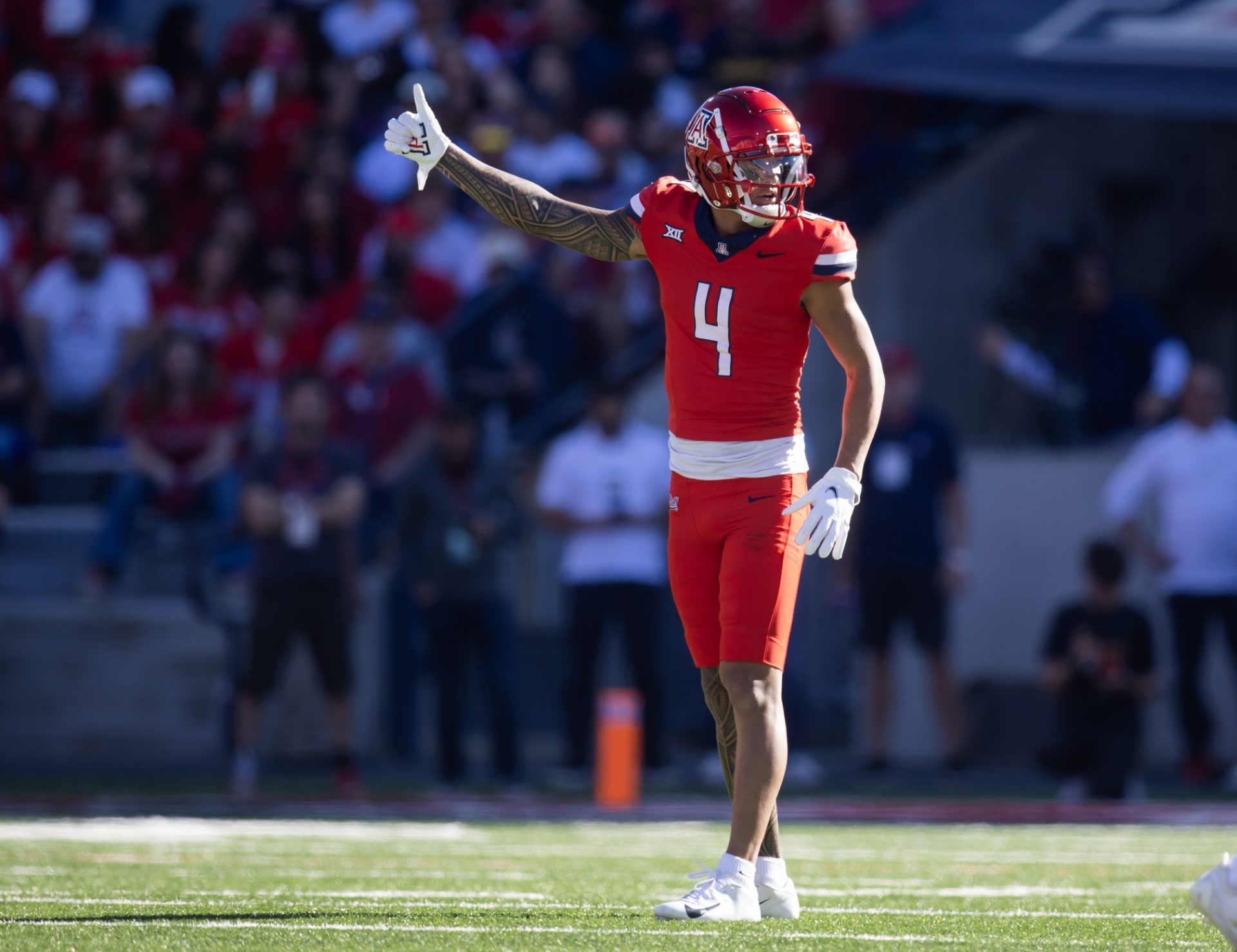 Arizona Wildcats wide receiver Tetairoa McMillan (4) against the Arizona State Sun Devils during the Territorial Cup at Arizona Stadium.