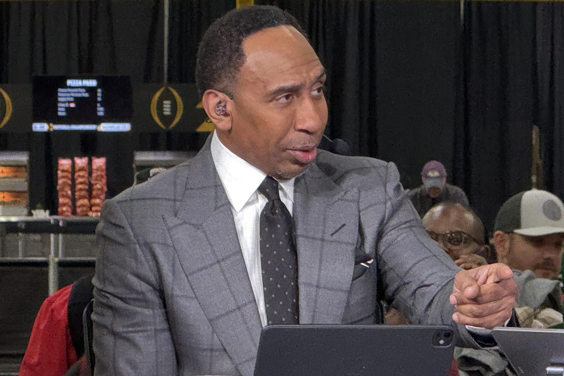 ESPN personality Stephen A. Smith on the ESPN First Take set at the CFP Fan Central at the George World Congress Center.