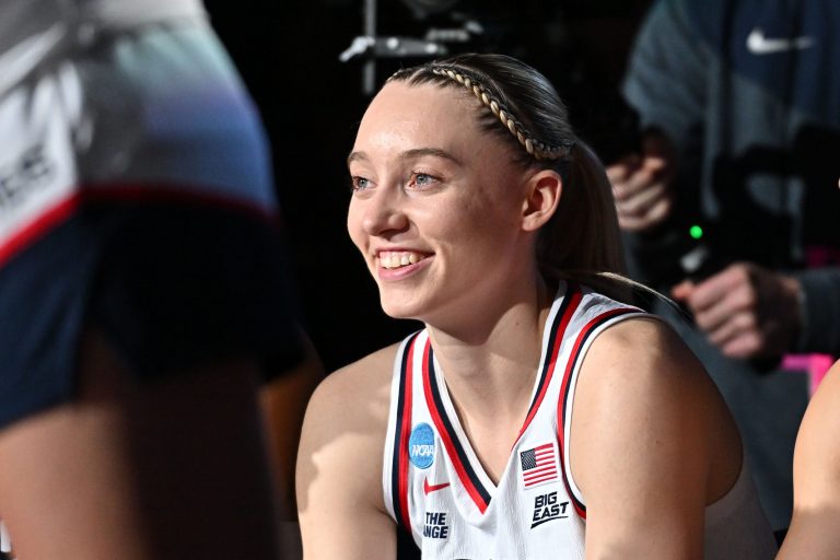 UConn Huskies guard Paige Bueckers (5) looks on during a Sweet 16 NCAA Tournament basketball game against the Oklahoma Sooners at Spokane Arena. at Spokane Arena.