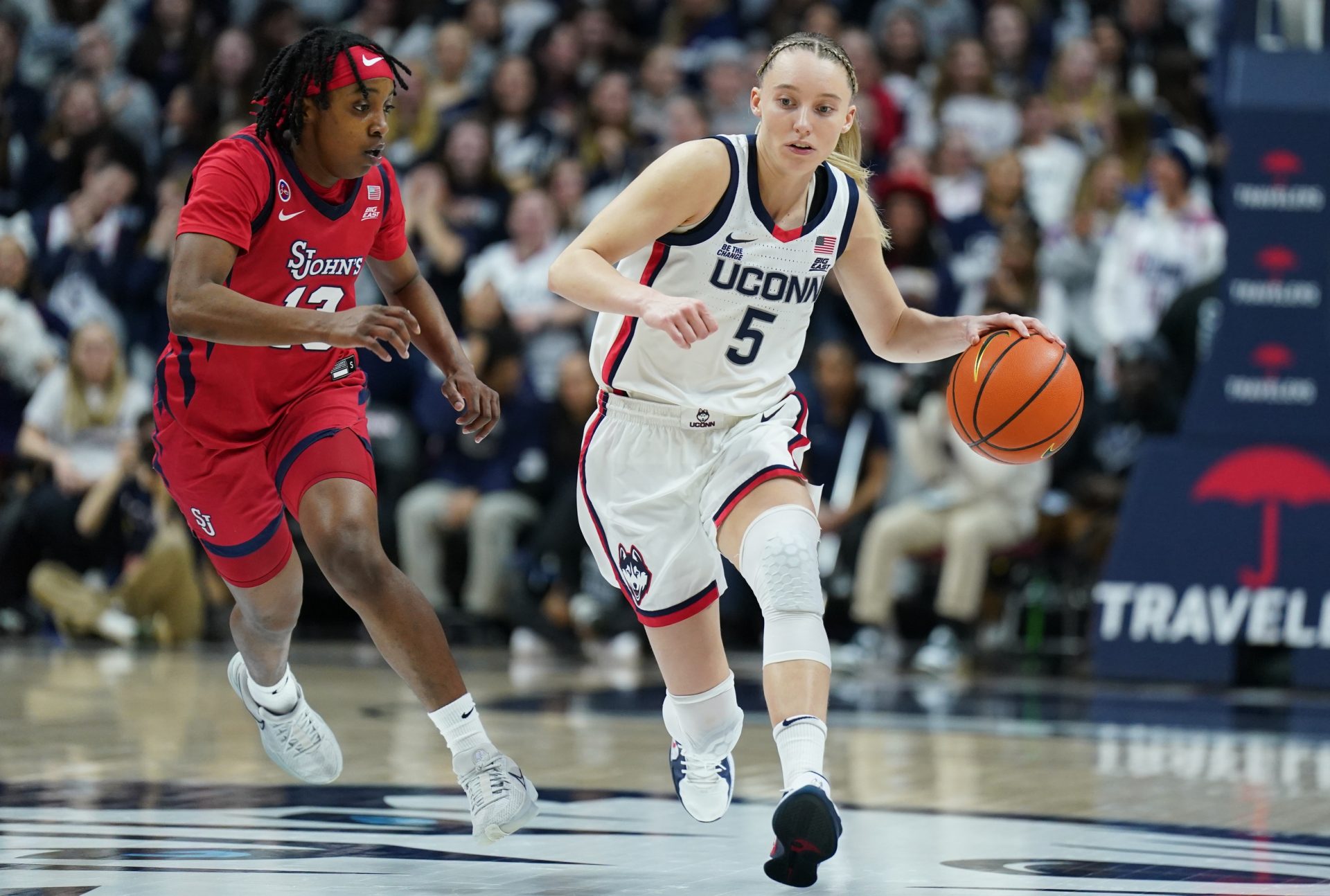 UConn Huskies guard Paige Bueckers (5) returns the ball against St. John's Red Storm guard Lashae Dwyer (13) in the second half at Harry A. Gampel Pavilion.