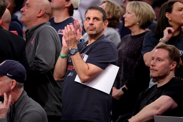 American businessman and St. John's donor Mike Repole stands and applauds during the second half against the Butler Bulldogs at Madison Square Garden.