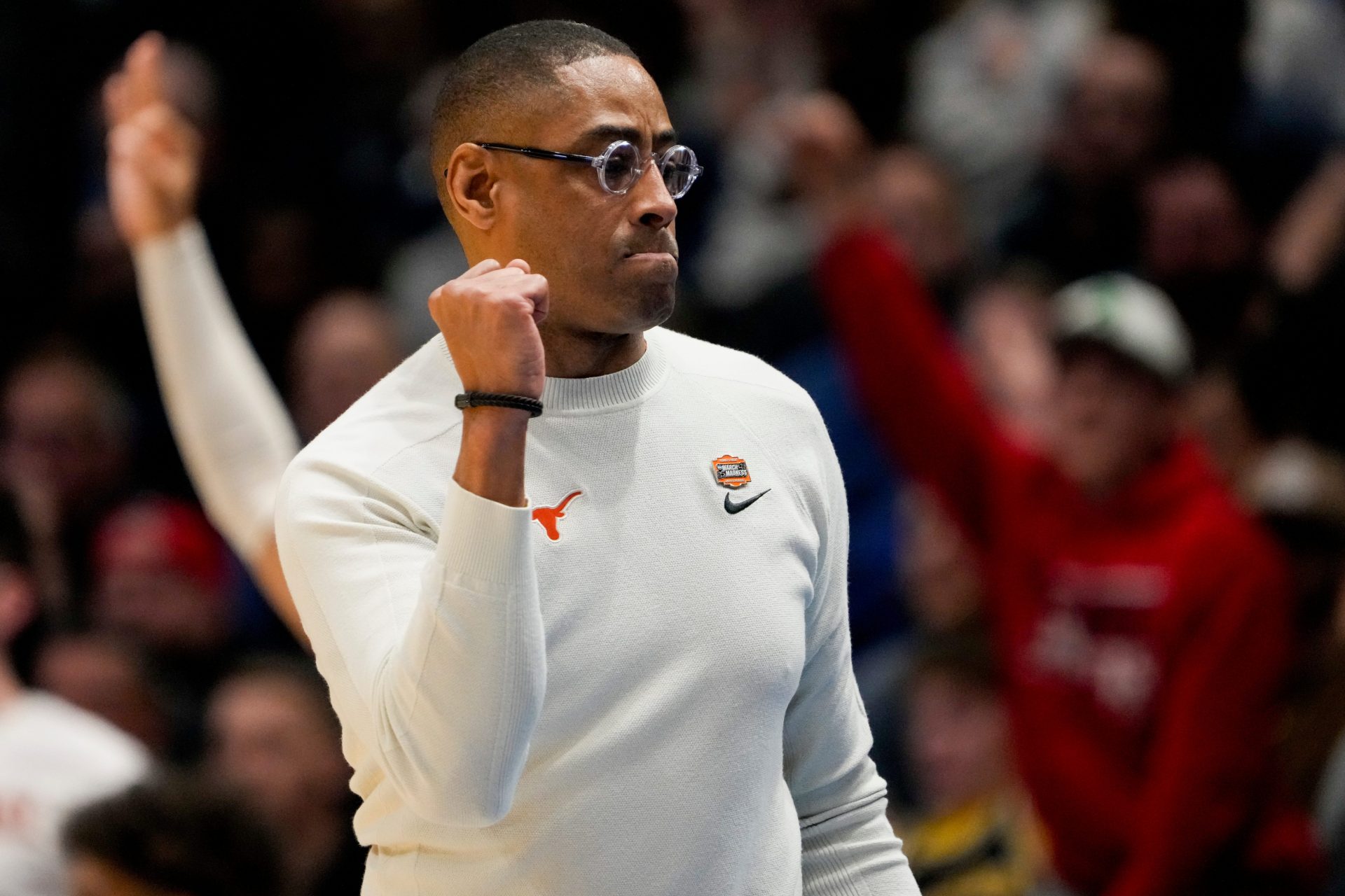 Texas Longhorns head coach Rodney Terry reacts to a basket in the first half of the NCAA Tournament First Four