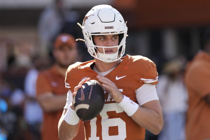 Texas Longhorns quarterback Arch Manning (16) warms up before a game against the Kentucky Wildcats at Darrell K Royal-Texas Memorial Stadium.