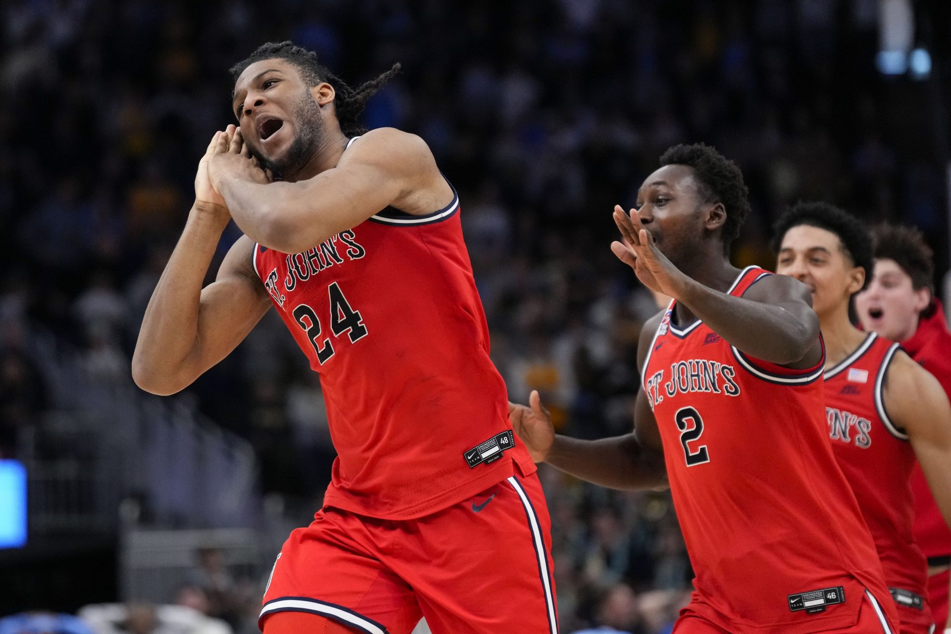 St. John’s Red Storm forward Zuby Ejiofor (24) celebrates after making the game winning shot in overtime against the Marquette Golden Eagles at Fiserv Forum.