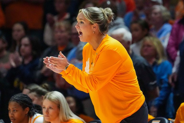 Tennessee Lady Vols head coach Kim Caldwell claps during a women's college basketball game between the Lady Vols and Mississippi State