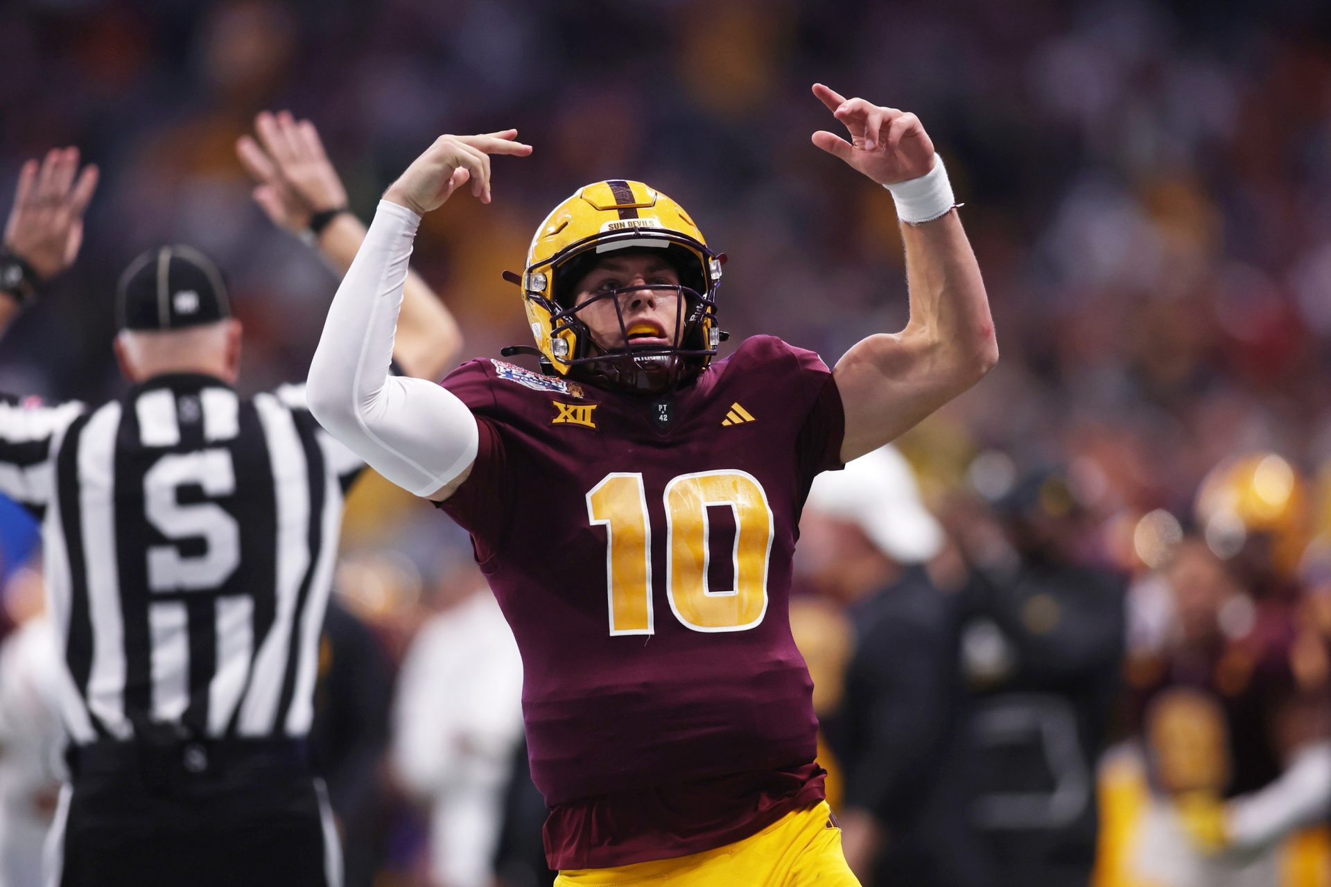 Arizona State Sun Devils quarterback Sam Leavitt (10) reacts after a play against the Texas Longhorns during the second half of the Peach Bowl at Mercedes-Benz Stadium.