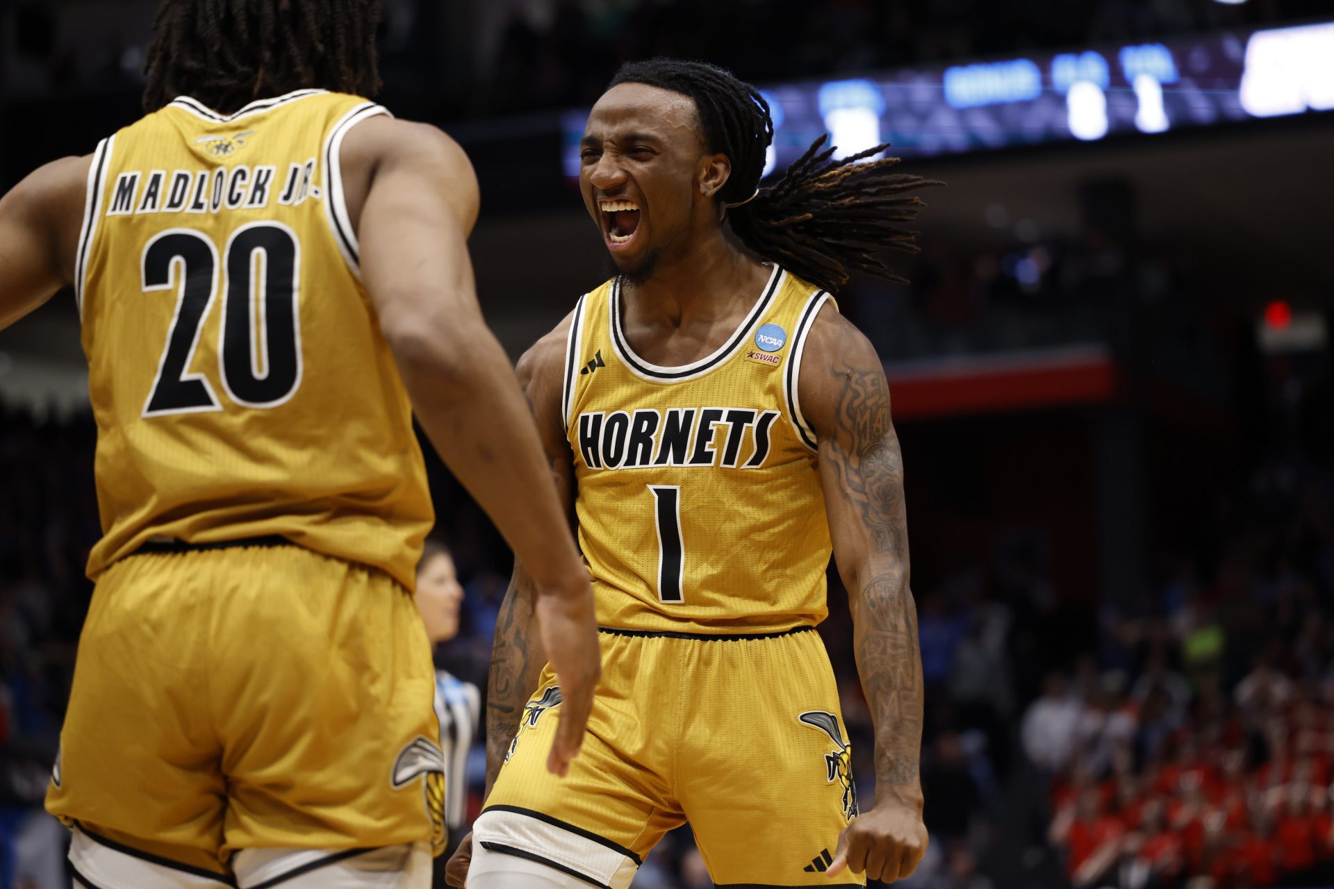 Alabama State Hornets guard Amarr Knox (1) celebrates with guard TJ Madlock (20) in the second half against the St. Francis (Pa) Red Flash at UD Arena.