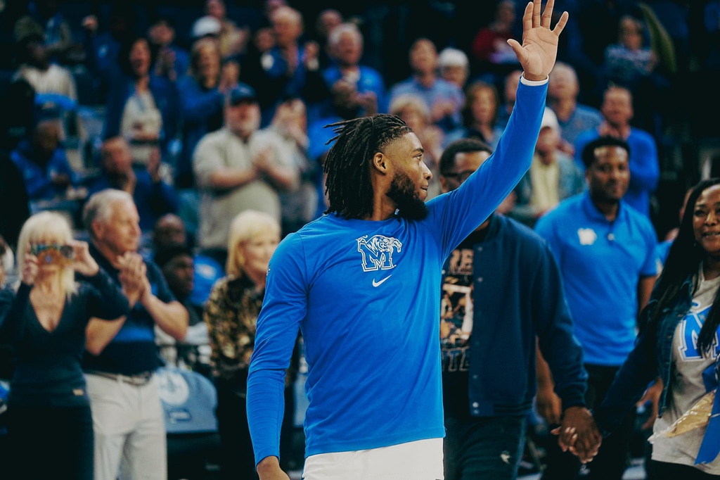 Memphis Tigers’ Tyrese Hunter is celebrated on senior night before a game against South Florida